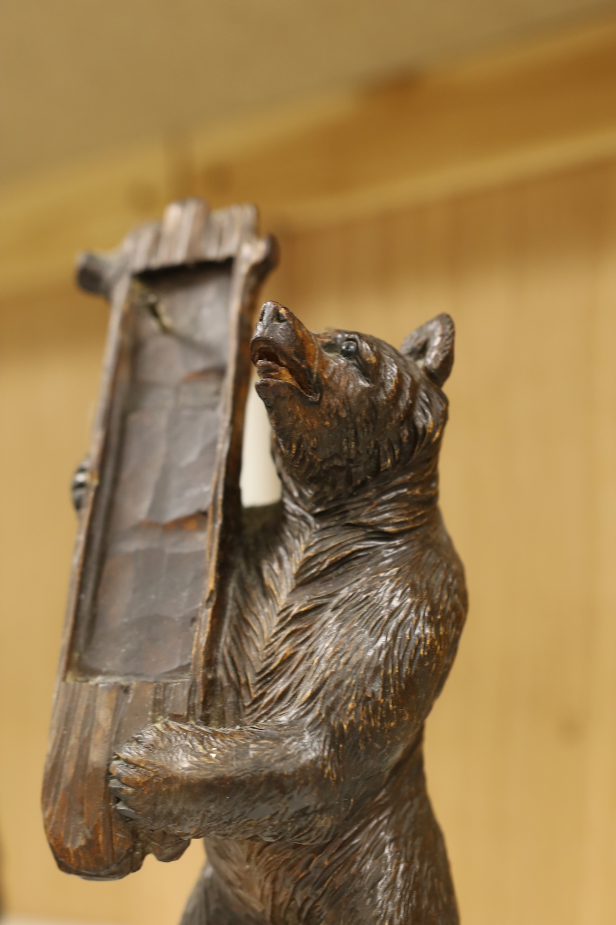 A Black Forest bear stand, 23cm high. Condition - fair needs re waxing